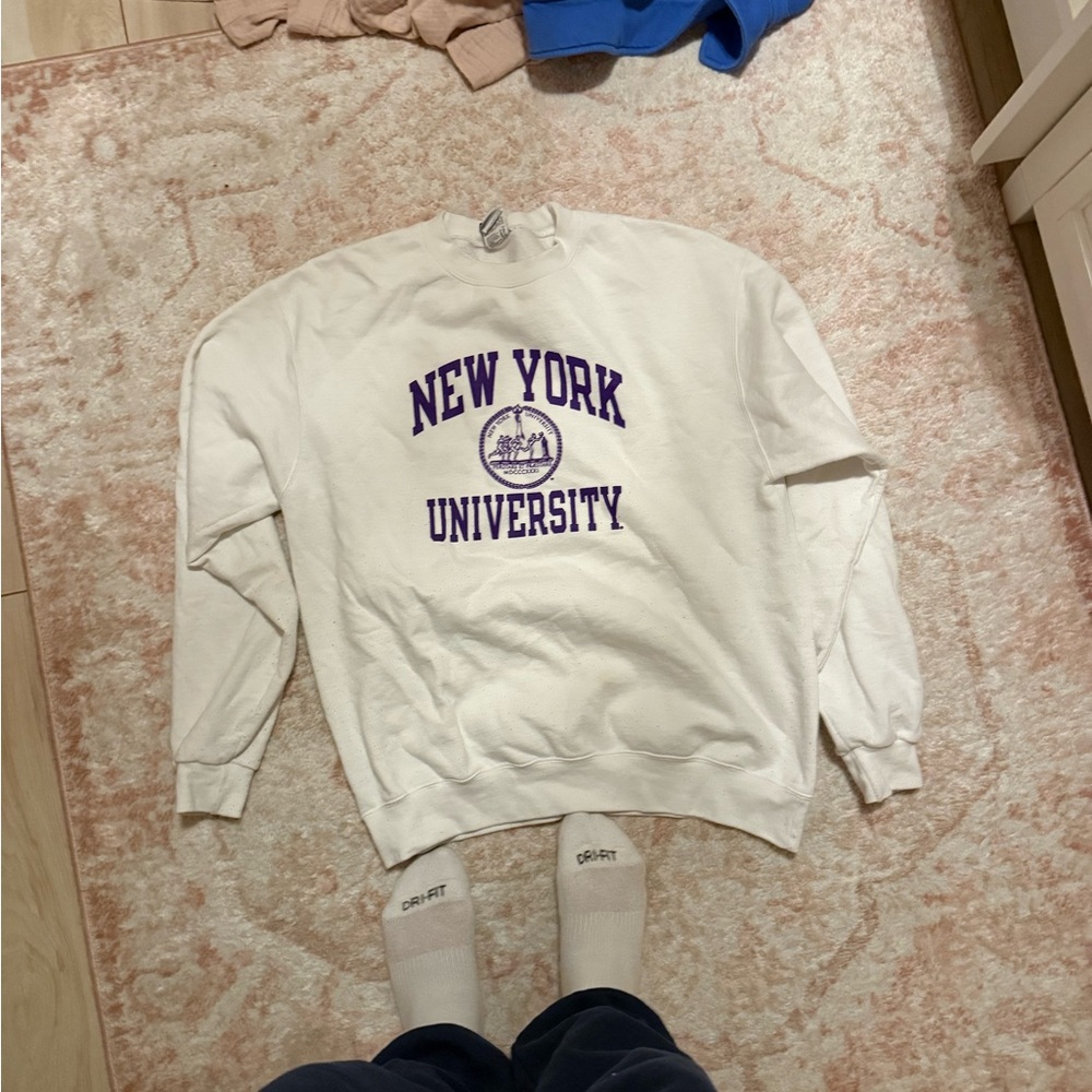 White NYU Sweatshirt with Purple Logo
